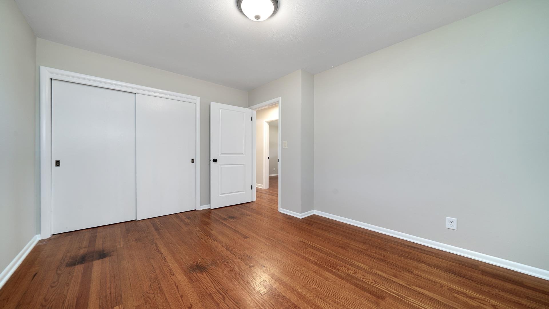 4604 Mohawk Road Rockford, IL 61107 - Photo 18 of 30 a view of empty room with wooden floor