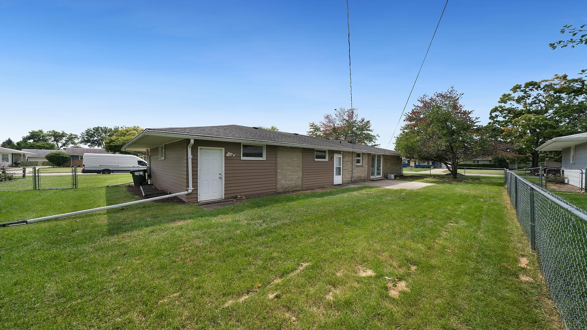 4604 Mohawk Road Rockford, IL 61107 - Photo 30 of 30 a view of a house with backyard