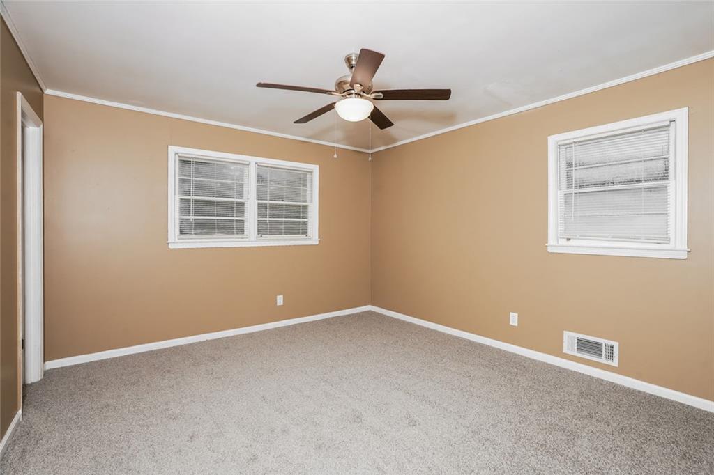 1320 North Cherokee Avenue Griffin, GA 30224 - Photo 14 of 20 a view of an empty room with a window
