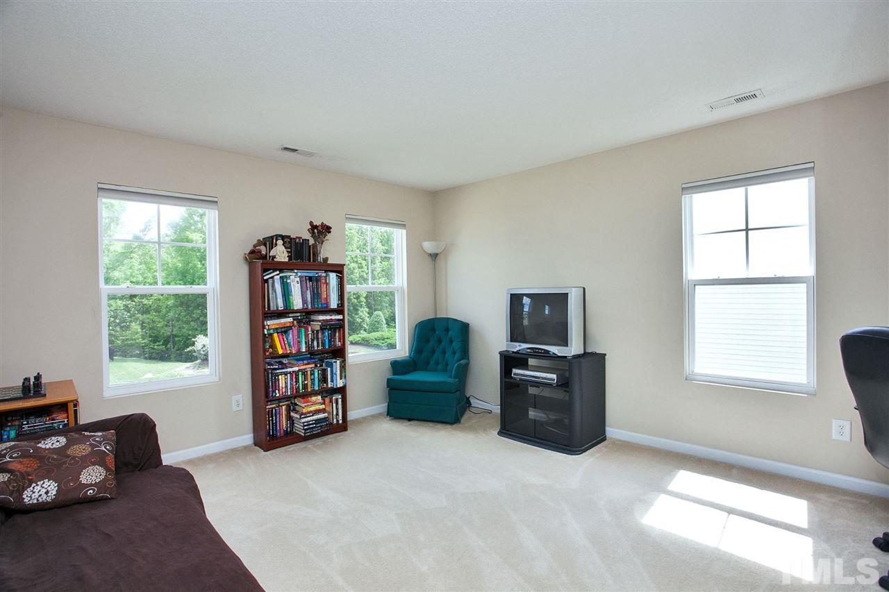 6838 Harter Court Raleigh, NC 27610 - Photo 15 of 25 Game Room - Kid's Area - Entertainment Center - lots of options!