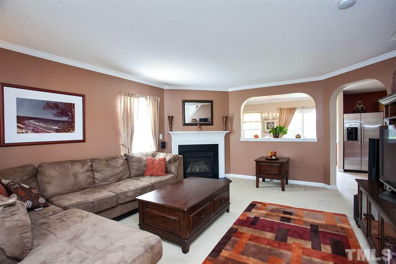 6838 Harter Court Raleigh, NC 27610 - Photo 3 of 25 Rounded pass through and archway add a dramatic effect ...