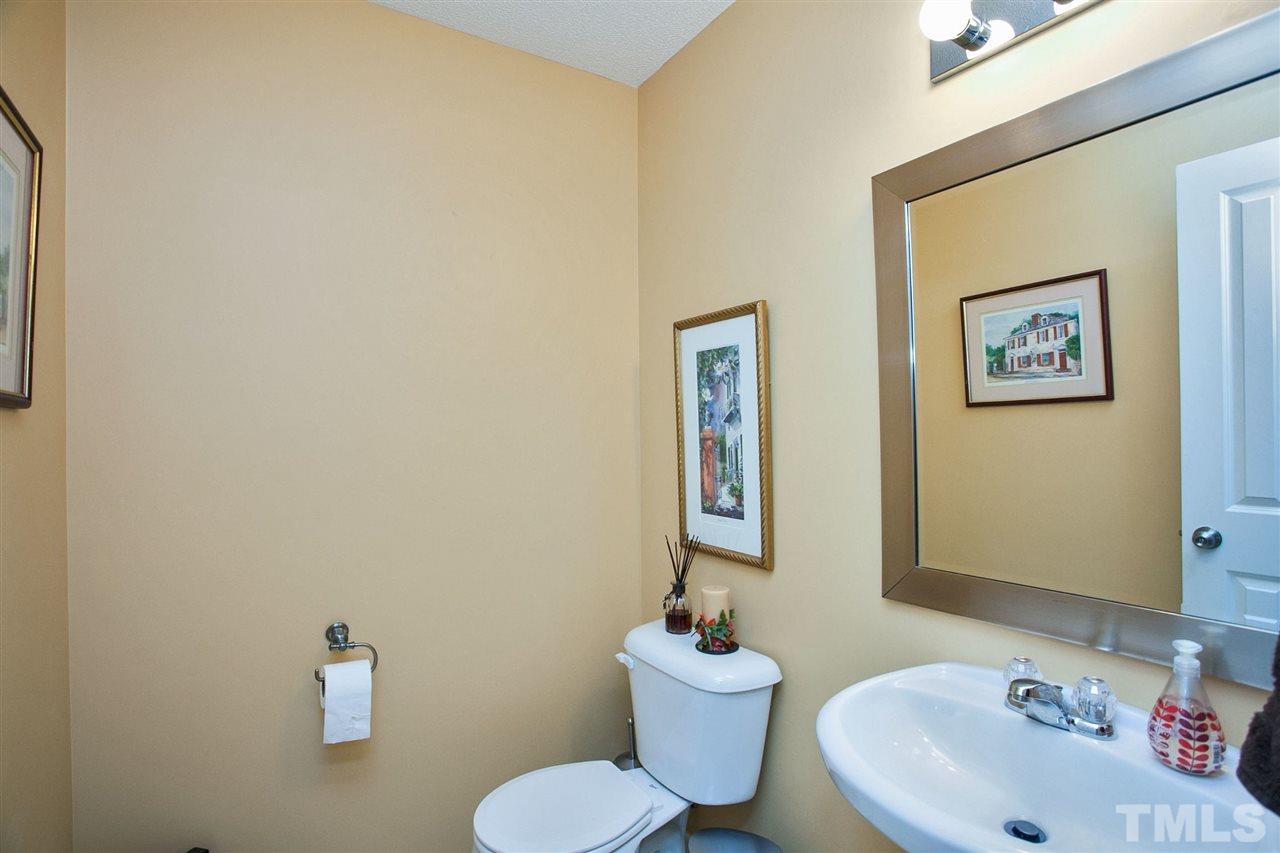 6838 Harter Court Raleigh, NC 27610 - Photo 20 of 25 Located downstairs .... features a gorgeous mirror!