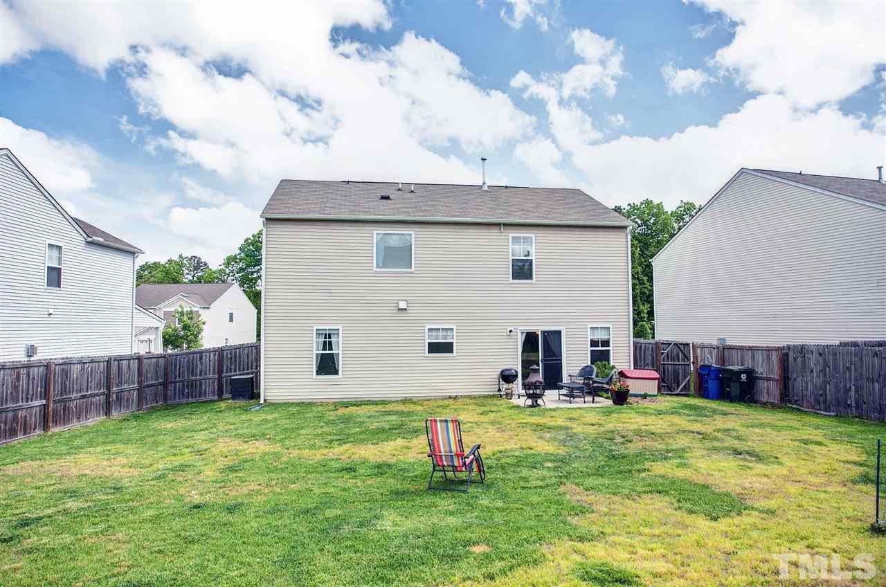 6838 Harter Court Raleigh, NC 27610 - Photo 22 of 25 Lots of room to run around in ... kids or pets would love to play in this yard!