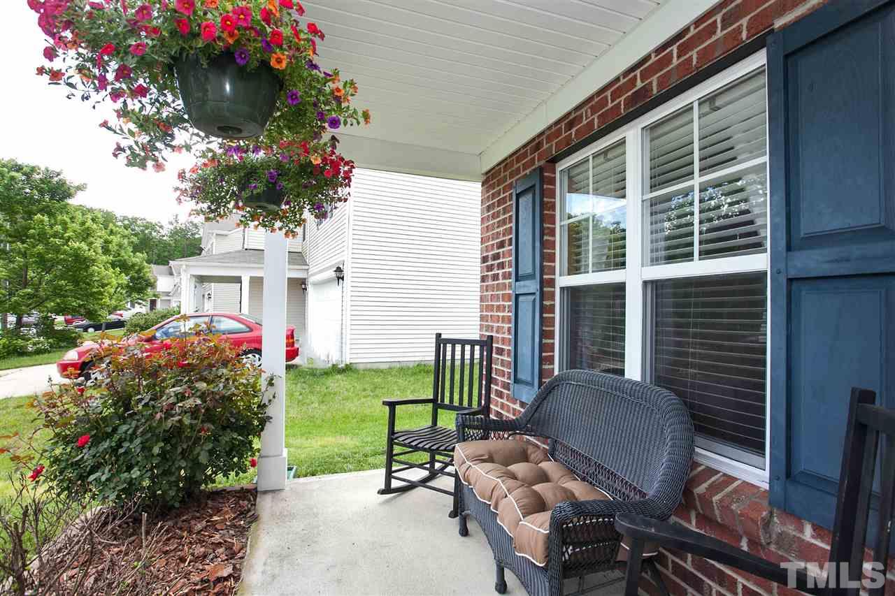 6838 Harter Court Raleigh, NC 27610 - Photo 24 of 25 The rose bushes provide a nice touch of color ...