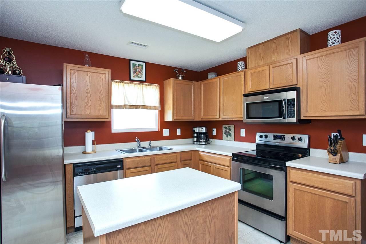 6838 Harter Court Raleigh, NC 27610 - Photo 6 of 25 A great working Kitchen with stainless steel appliances ....