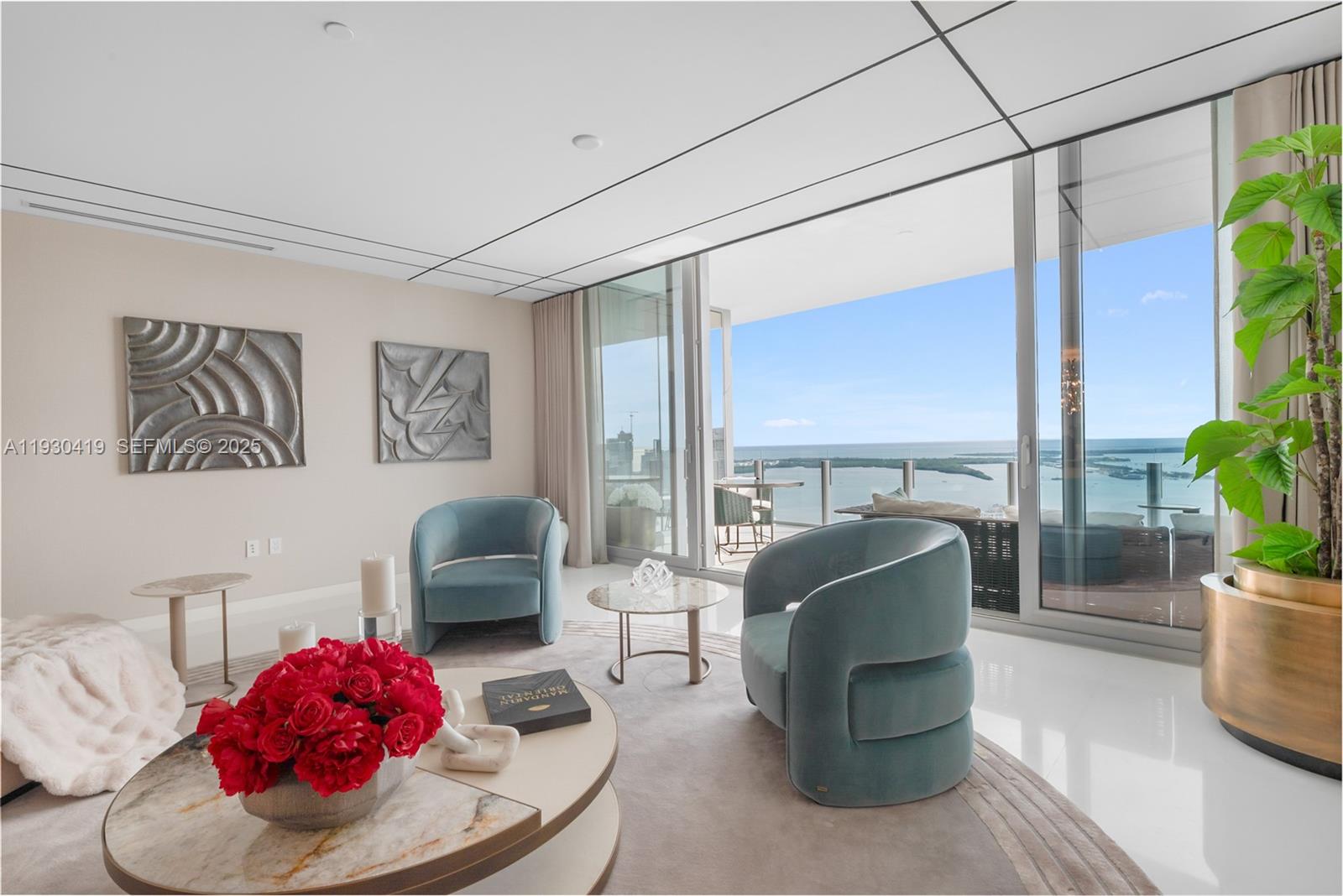 300 Biscayne Blvd Way, Unit 5104 Miami, FL 33131 - Photo 6 of 35 a living room with furniture and a potted plant