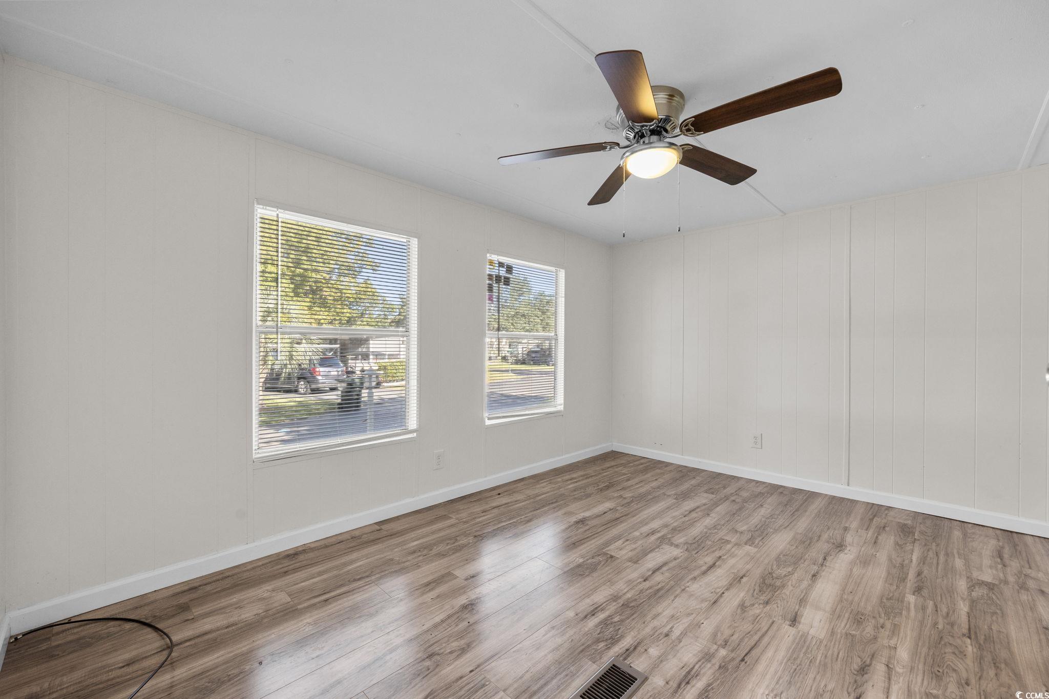 173 Braddock Court Murrells Inlet, SC 29576 - Photo 17 of 30 Unfurnished room featuring light hardwood / wood-s