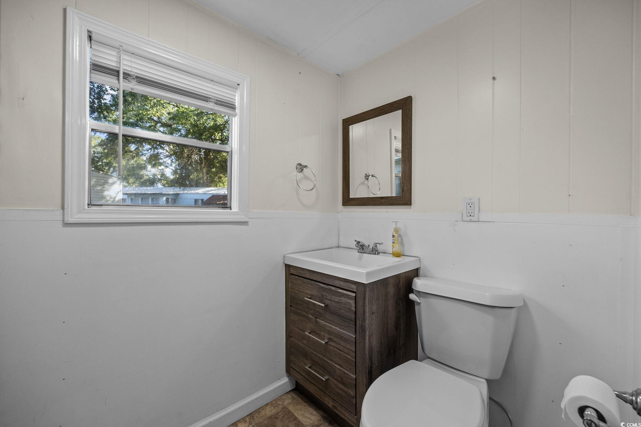 173 Braddock Court Murrells Inlet, SC 29576 - Photo 20 of 30 Bathroom with vanity and toilet