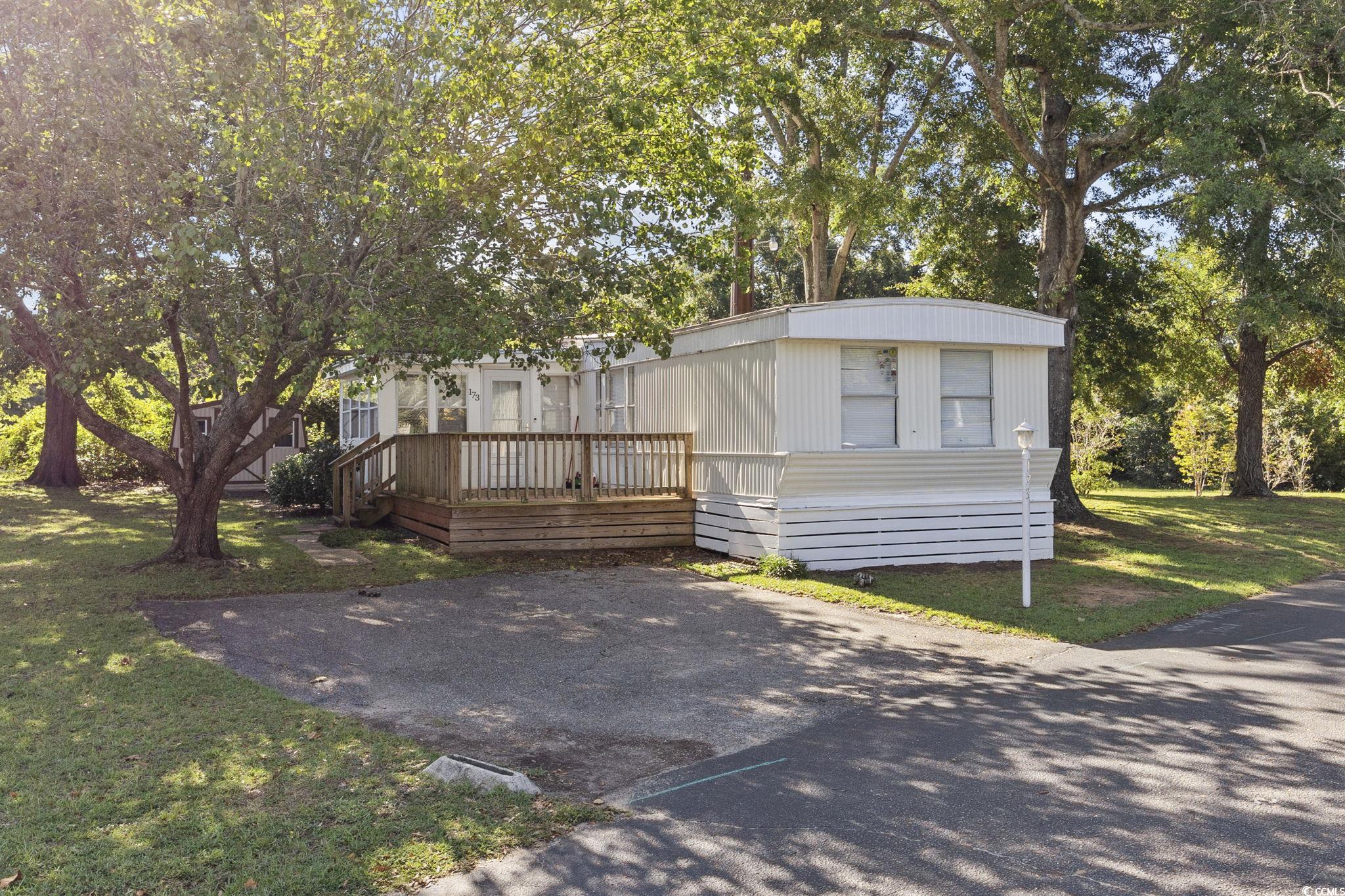 173 Braddock Court Murrells Inlet, SC 29576 - Photo 2 of 30 Manufactured / mobile home with a deck and a front