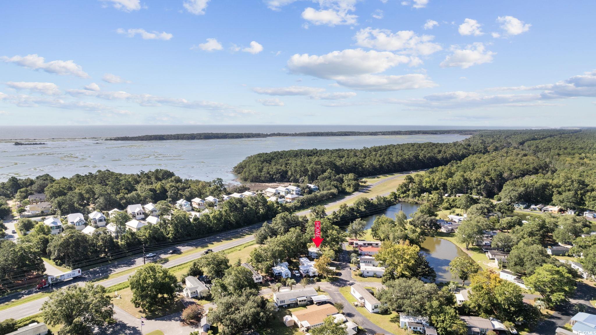173 Braddock Court Murrells Inlet, SC 29576 - Photo 28 of 30 Drone / aerial view with a water view