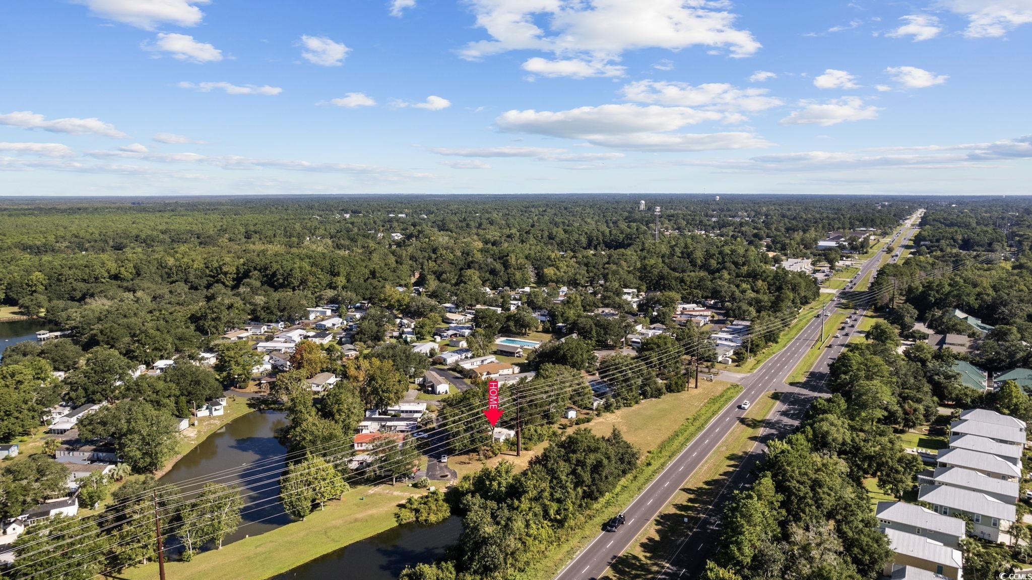 173 Braddock Court Murrells Inlet, SC 29576 - Photo 29 of 30 Drone / aerial view with a water view