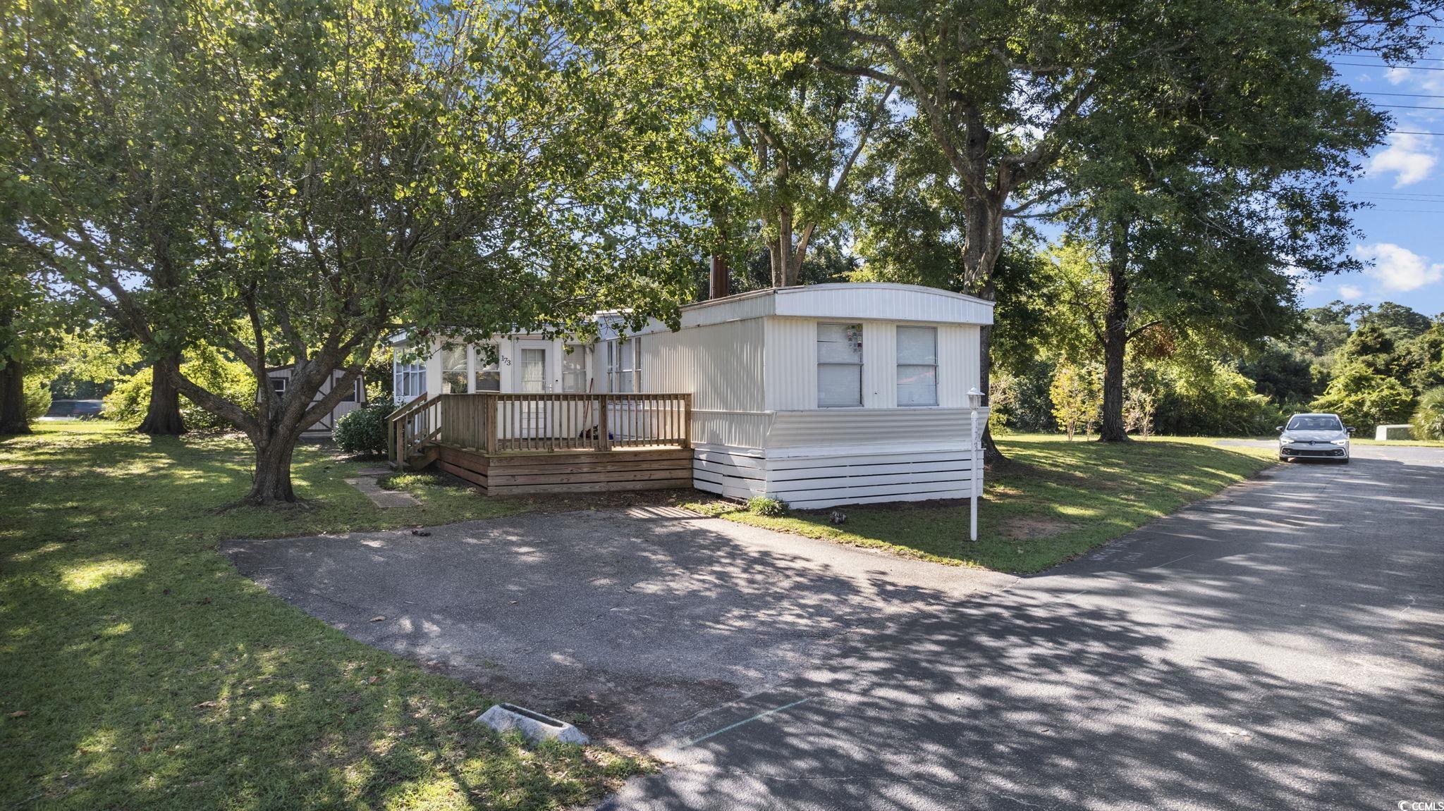 173 Braddock Court Murrells Inlet, SC 29576 - Photo 3 of 30 Manufactured / mobile home with a front lawn and a