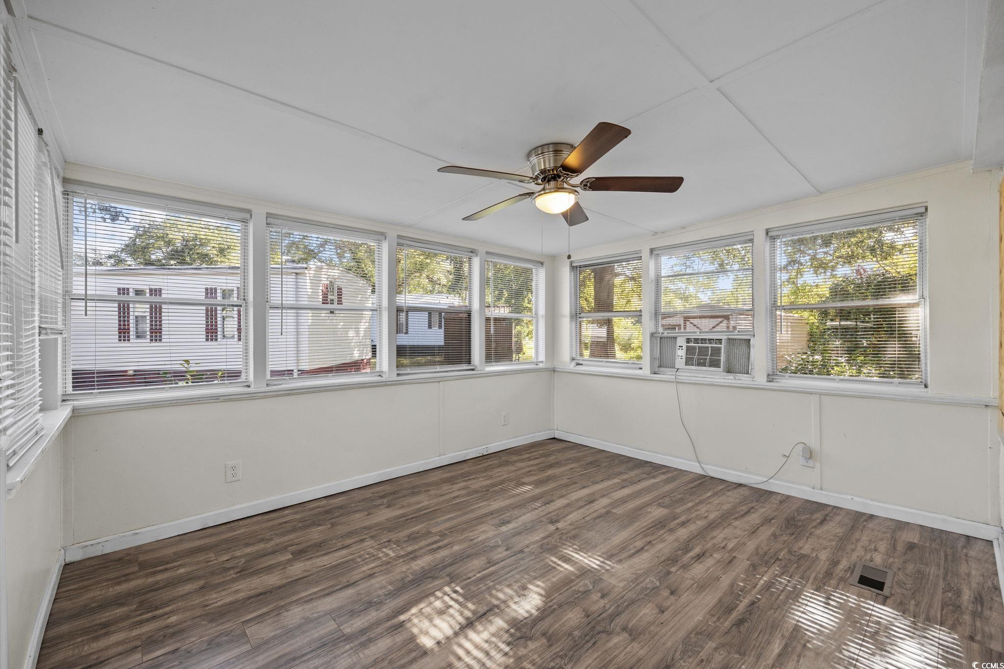173 Braddock Court Murrells Inlet, SC 29576 - Photo 7 of 30 Unfurnished sunroom featuring a healthy amount of