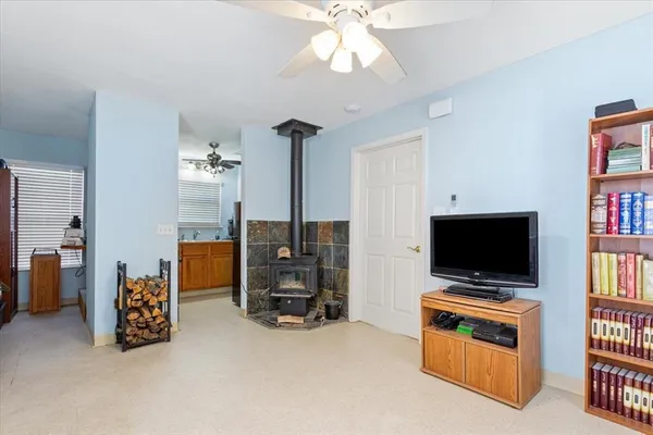 a view of livingroom with furniture and flat screen tv