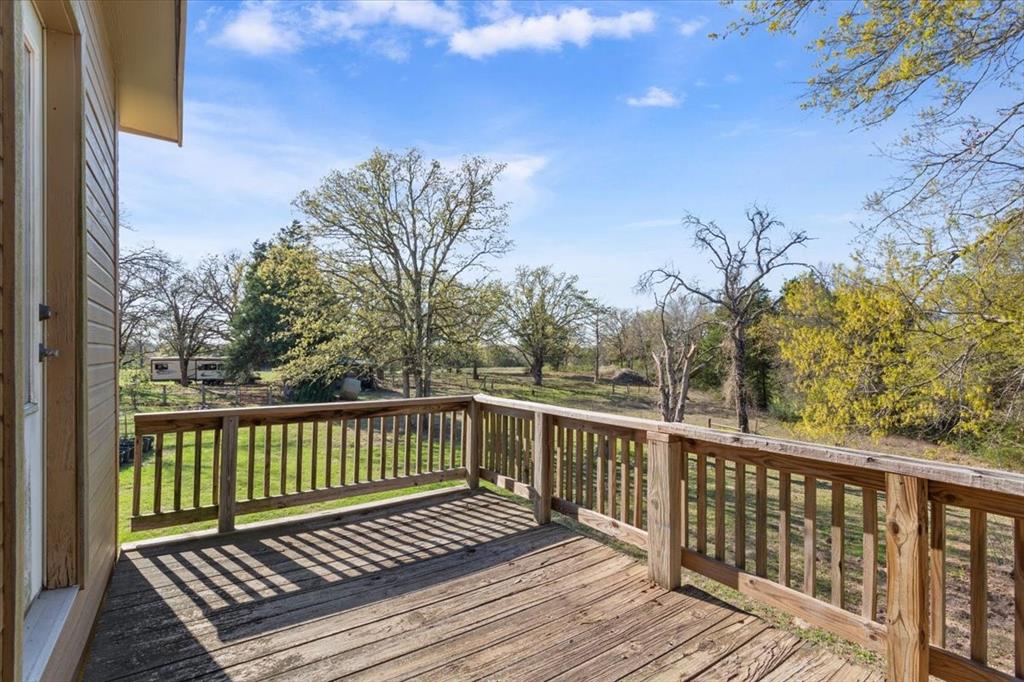 290 Fcr, Unit 481 Teague, TX 75860 - Photo 21 of 33 a view of a wooden roof deck