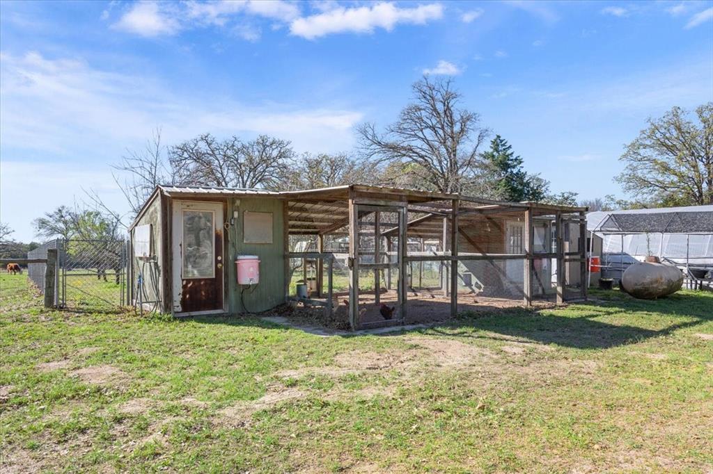 290 Fcr, Unit 481 Teague, TX 75860 - Photo 25 of 33 a view of a house with yard and sitting area