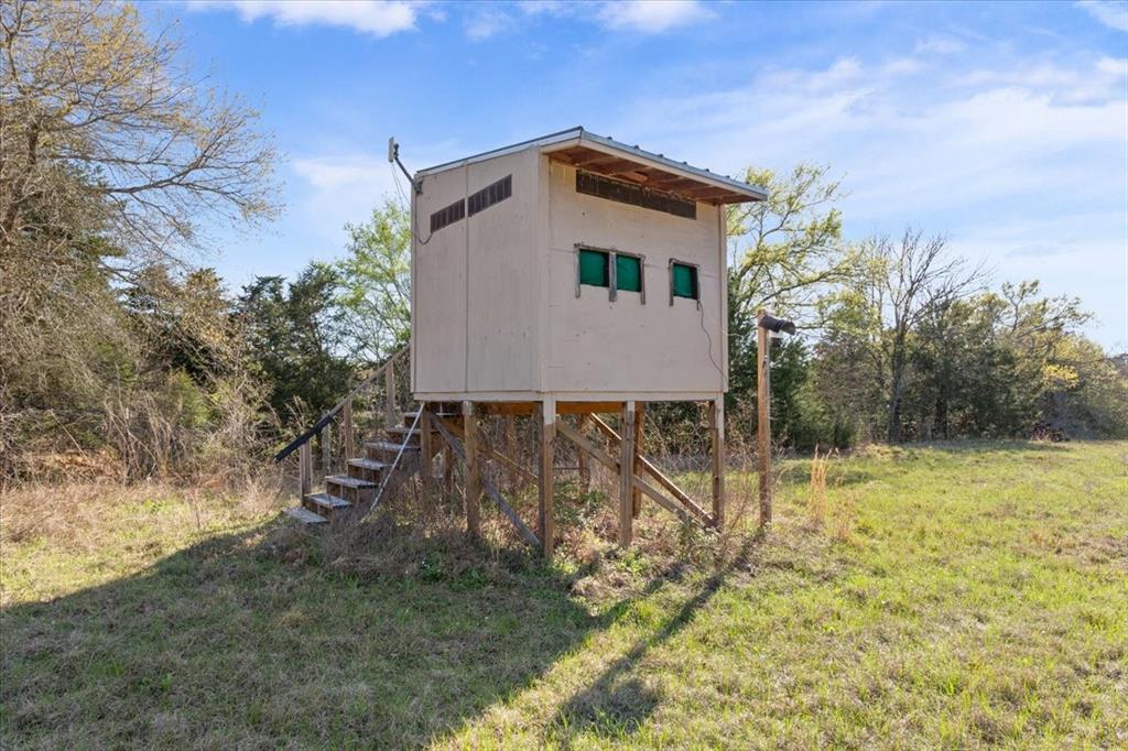290 Fcr, Unit 481 Teague, TX 75860 - Photo 30 of 33 a backyard of a house with lots of green space
