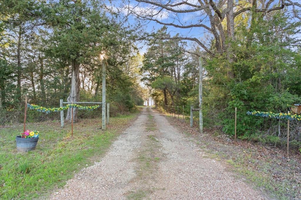 290 Fcr, Unit 481 Teague, TX 75860 - Photo 4 of 33 a view of a pathway with a yard