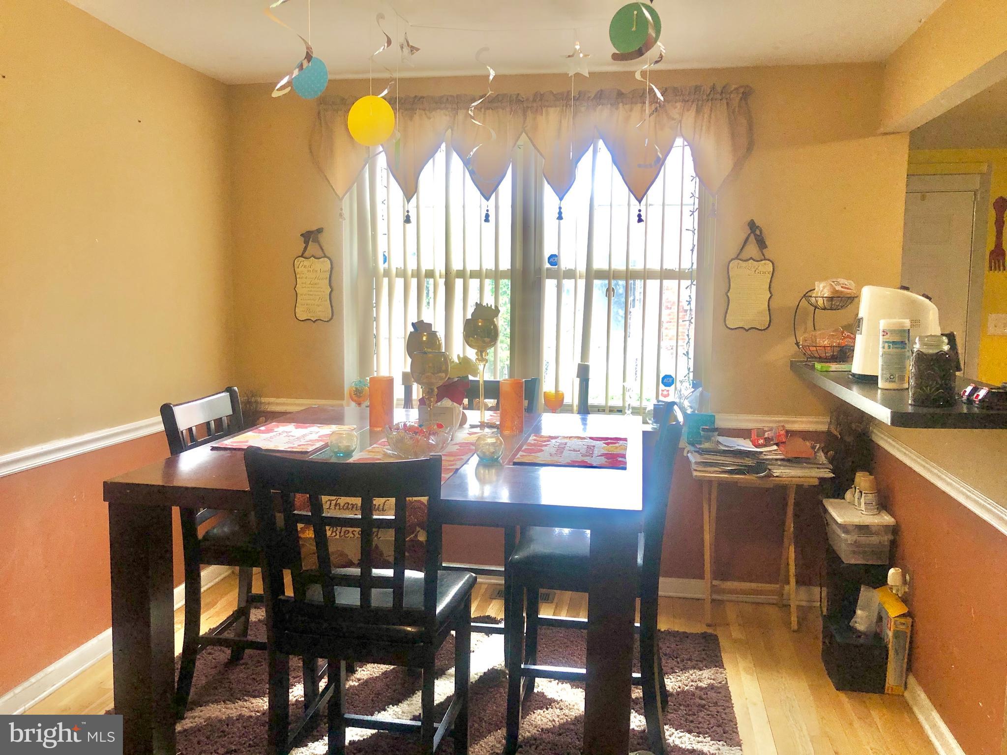 1581 Minnesota Road Camden, NJ 08104 - Photo 10 of 16 a view of a dining room with furniture window and outside view