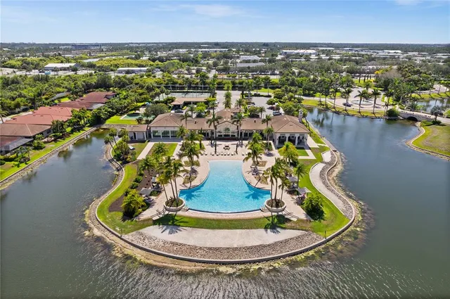 a view of a swimming pool with a lot of residential buildings in ocean