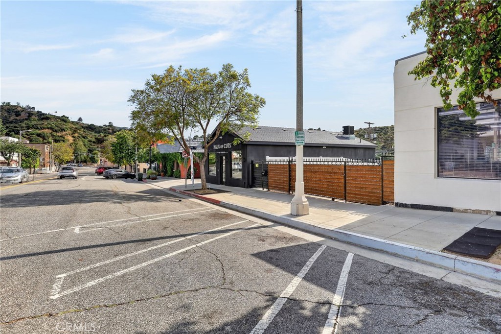 9939 Commerce Avenue Tujunga, CA 91042 - Photo 25 of 30 a view of a building with trees