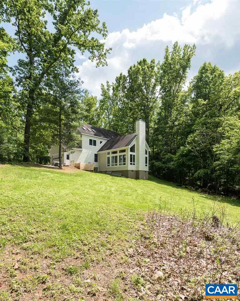 680 Broad Axe Road Charlottesville, VA 22903 - Photo 19 of 19 a front view of a house with yard and green space