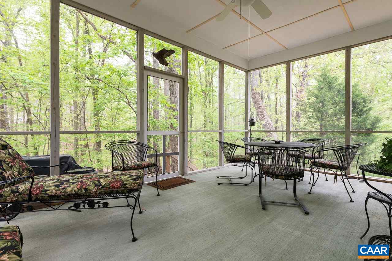 680 Broad Axe Road Charlottesville, VA 22903 - Photo 6 of 19 a living room with furniture and floor to ceiling windows