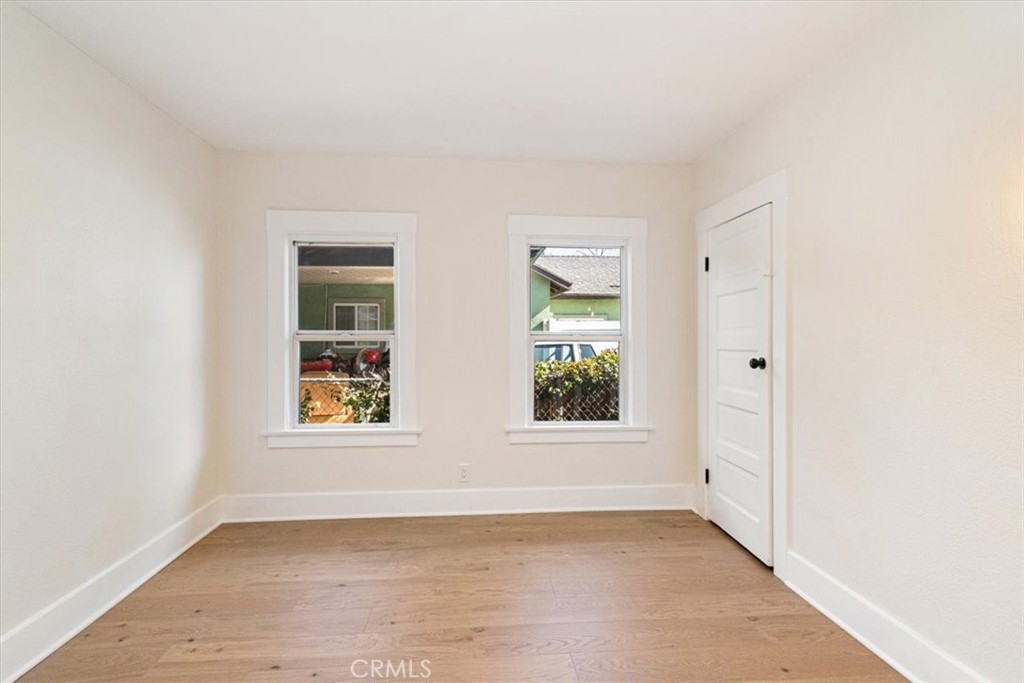 4474 Highland Place Riverside, CA 92506 - Photo 17 of 31 an empty room with windows