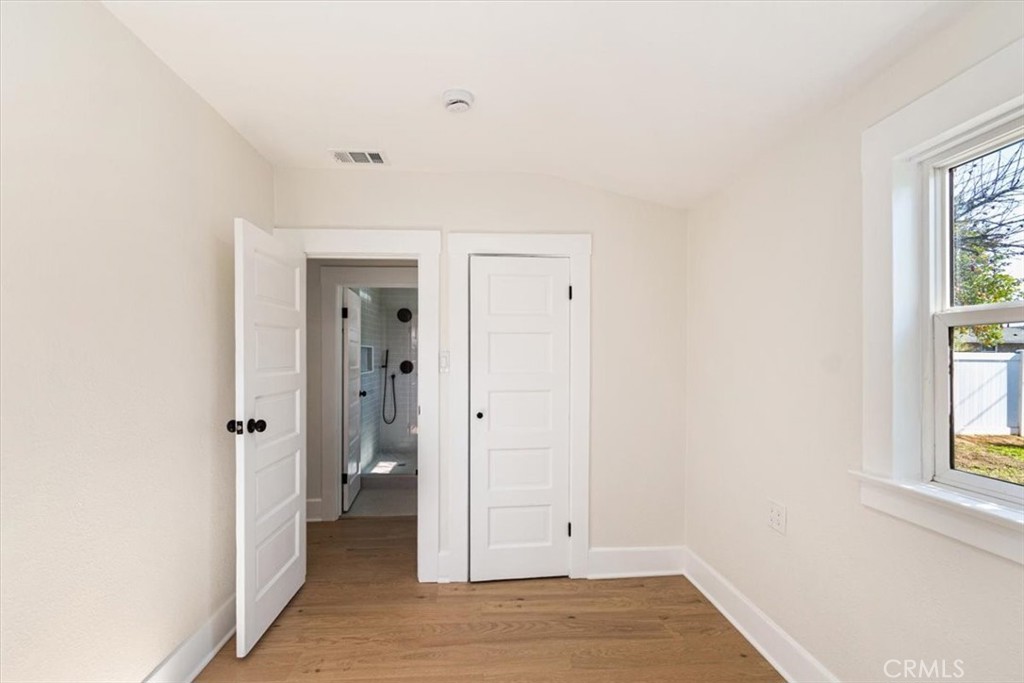4474 Highland Place Riverside, CA 92506 - Photo 18 of 31 an empty room with windows and closet