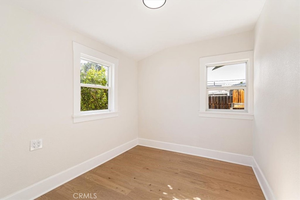 4474 Highland Place Riverside, CA 92506 - Photo 19 of 31 an empty room with a window