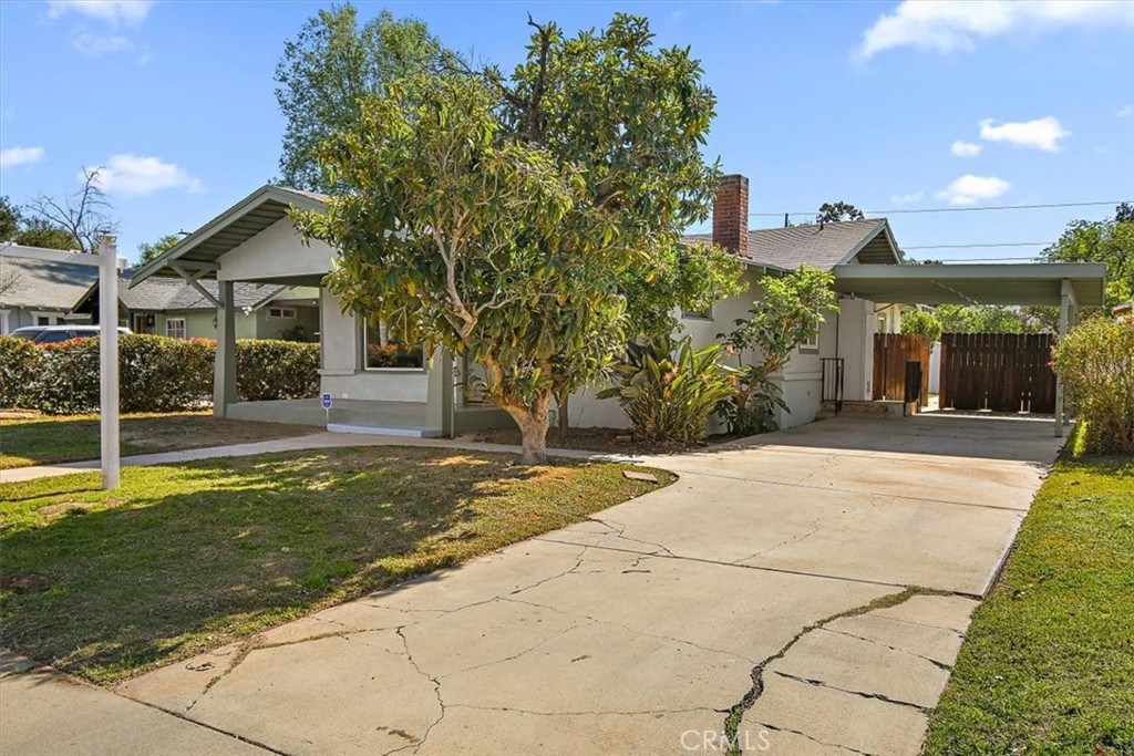 4474 Highland Place Riverside, CA 92506 - Photo 27 of 31 a house view with a garden space