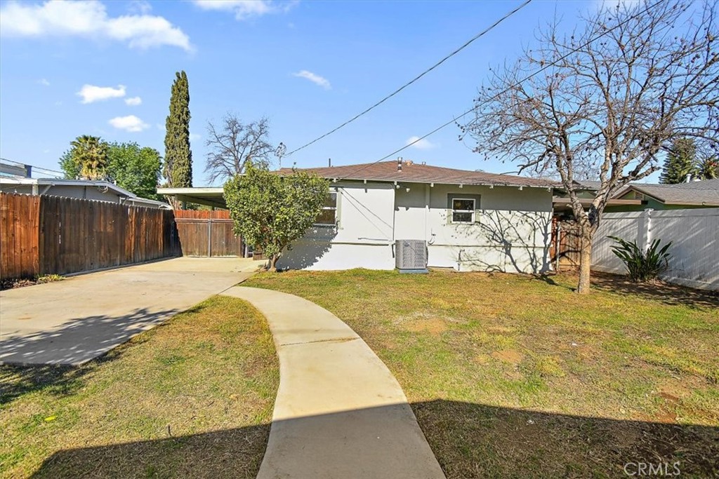 4474 Highland Place Riverside, CA 92506 - Photo 31 of 31 a view of a swimming pool with a yard