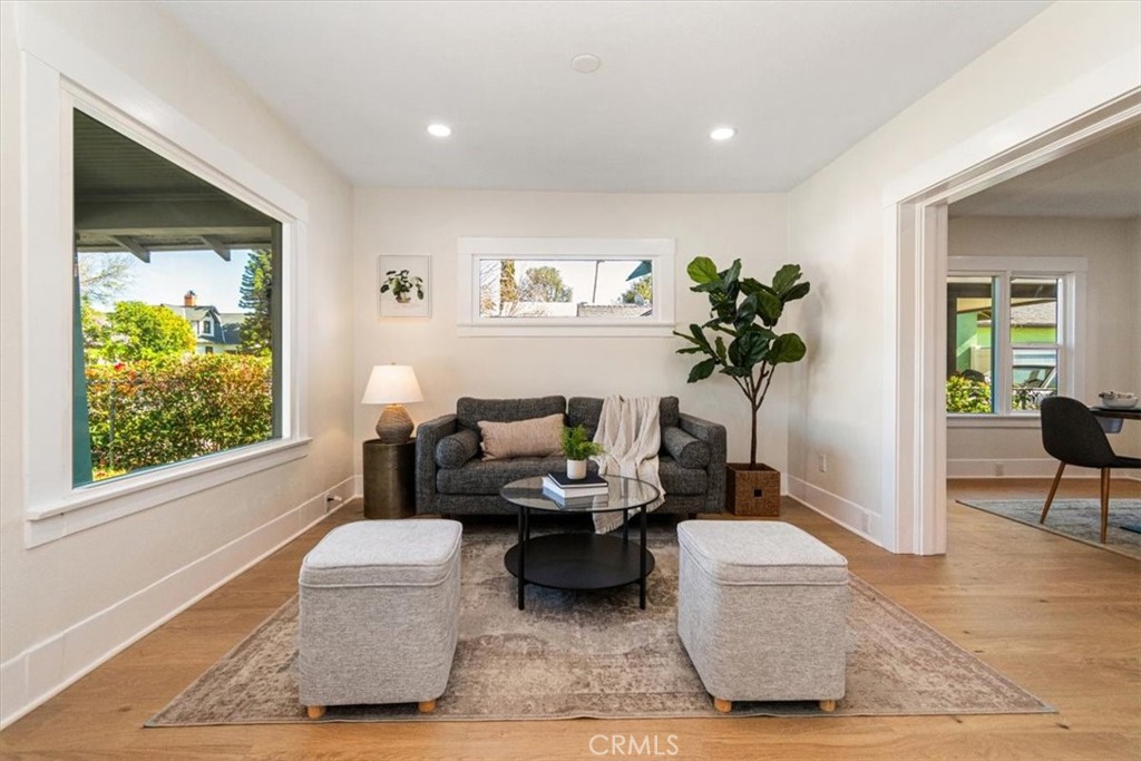 4474 Highland Place Riverside, CA 92506 - Photo 4 of 31 a living room with furniture and a potted plant