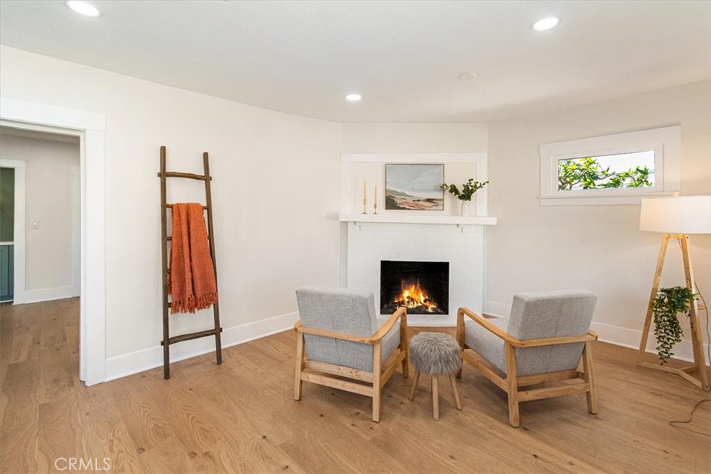 4474 Highland Place Riverside, CA 92506 - Photo 7 of 31 a view of a livingroom with furniture and a fireplace