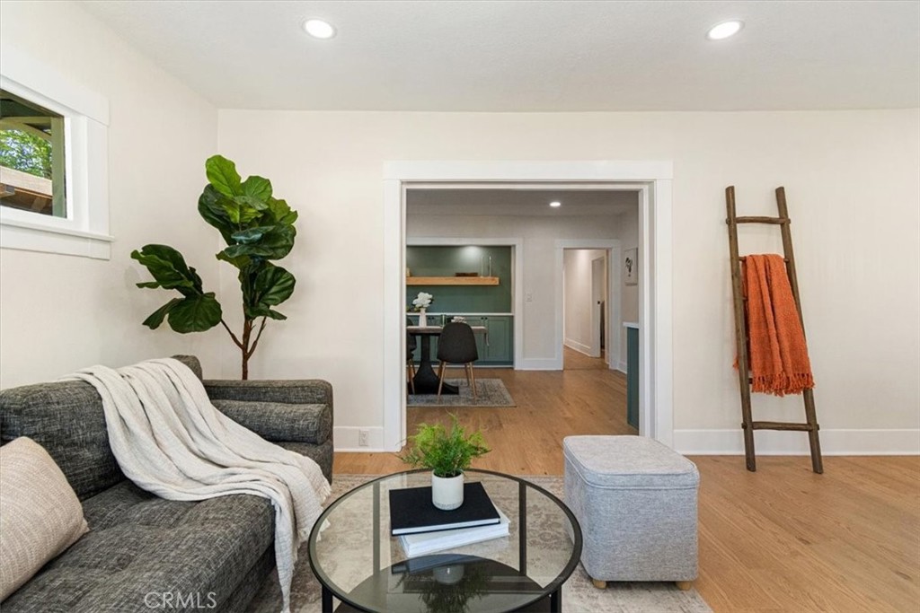 4474 Highland Place Riverside, CA 92506 - Photo 9 of 31 a room with furniture and a potted plant