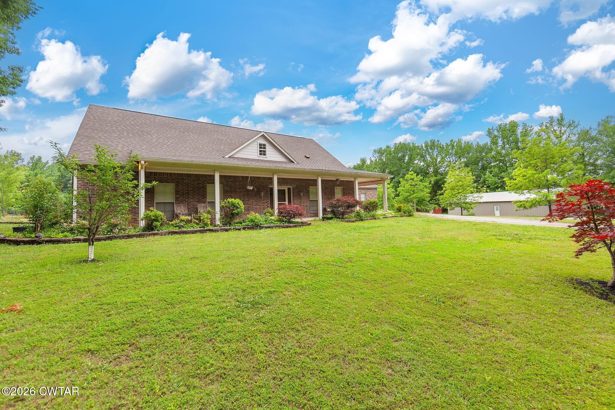 4080 Beech Bluff Road Beech Bluff, TN 38313 - Photo 2 of 41 a view of a house with a big yard