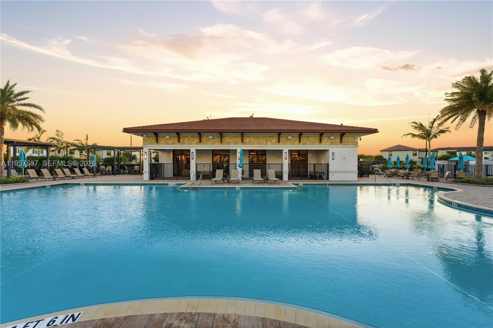 11456 West 33rd Way Hialeah, FL 33018 - Photo 31 of 49 a view of a house with pool and lake view