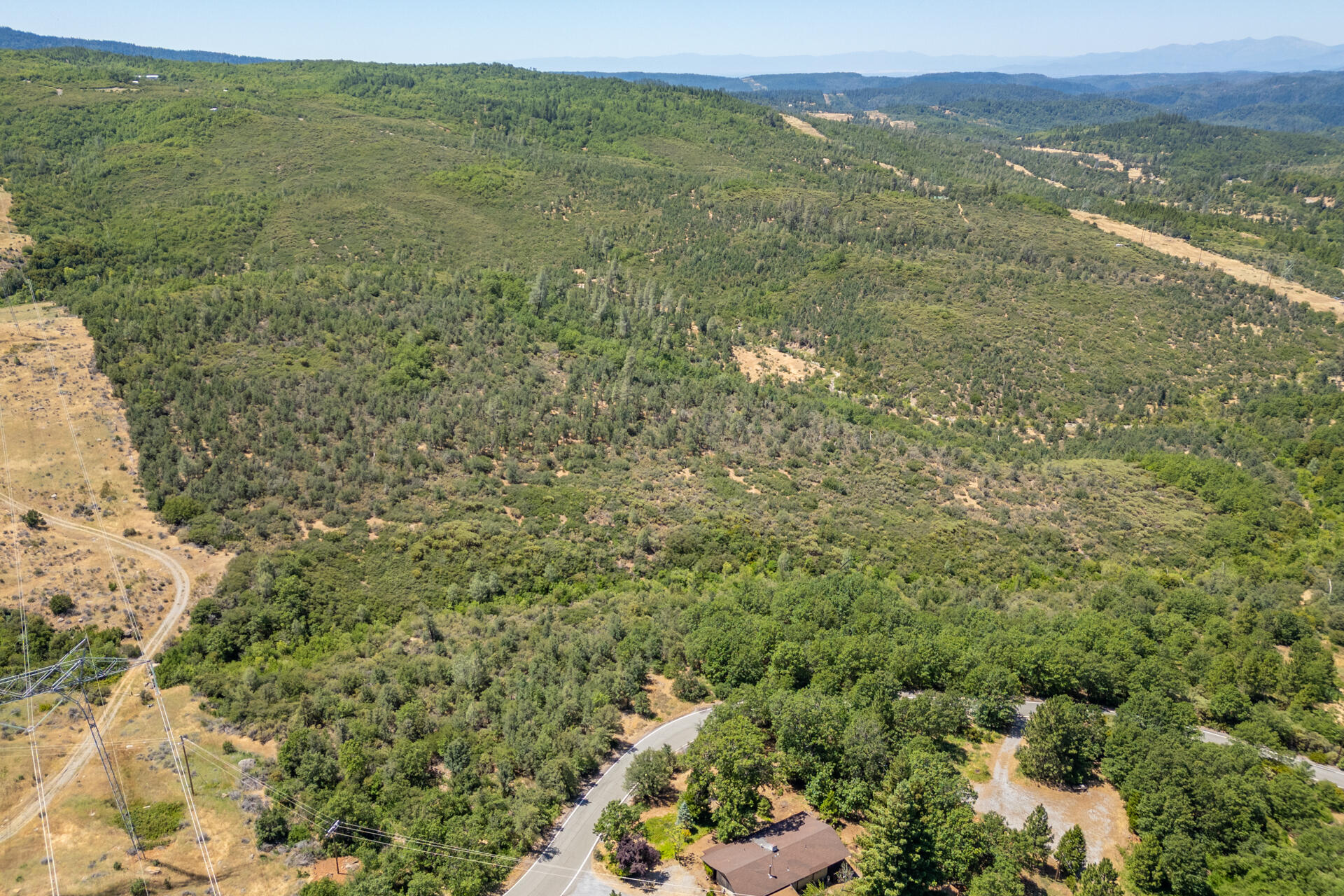 Frisby Road Round Mountain, CA 96084 - Photo 3 of 14 a view of a field with an ocean view