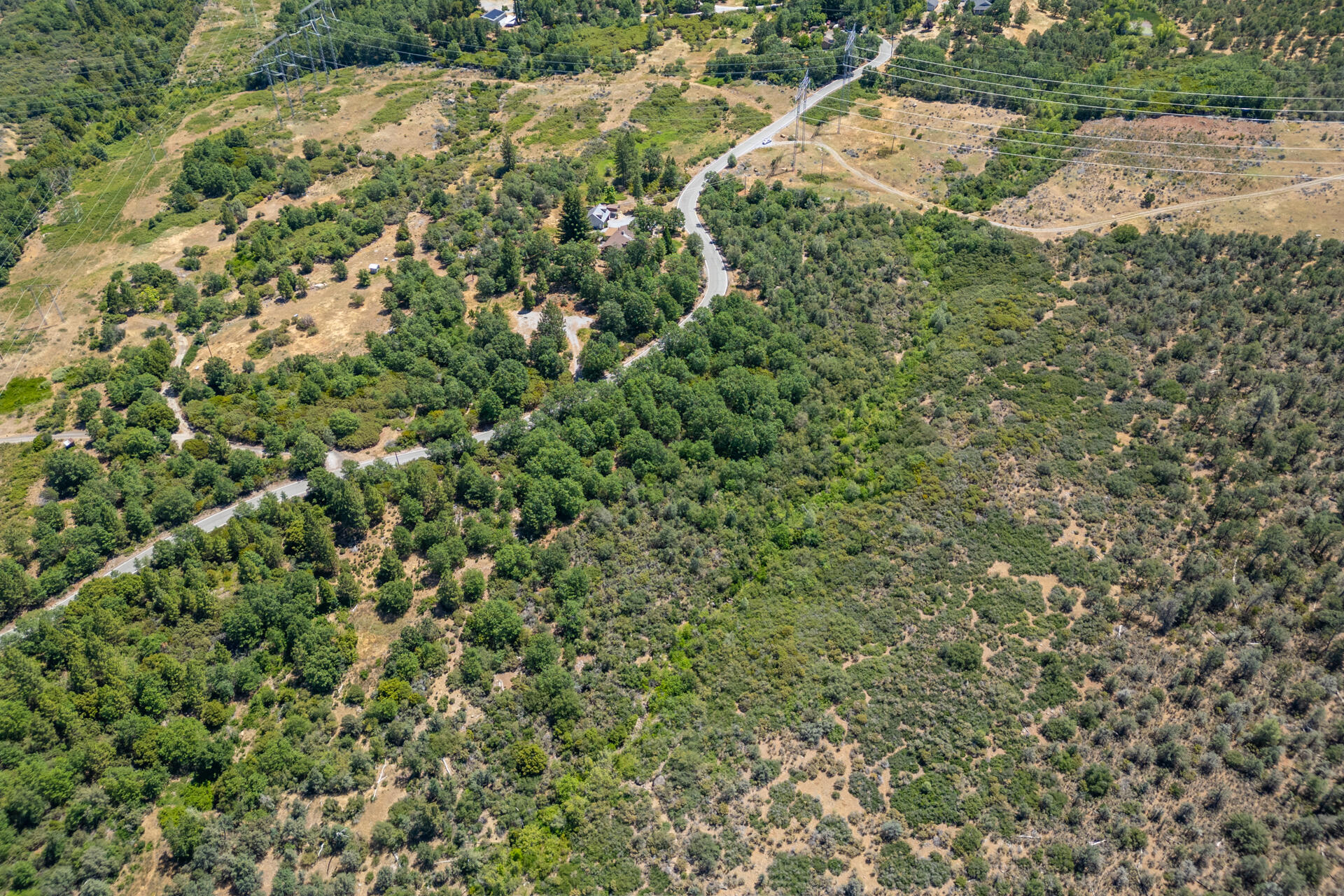 Frisby Road Round Mountain, CA 96084 - Photo 8 of 14 an aerial view of a house with a yard
