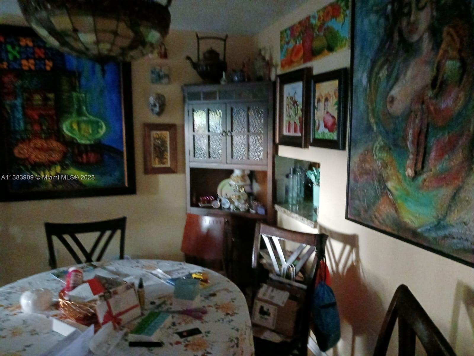 Kendale Lakes Miami, FL 33183 - Photo 3 of 5 a bedroom with furniture and a fireplace