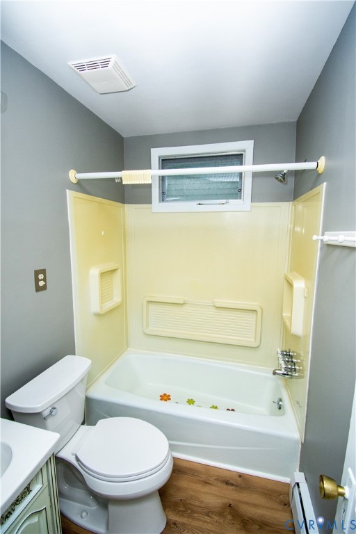 6800 Three Chopt Road Richmond, VA 23226 - Photo 23 of 26 Tub and shower combination with a window, wood-fin