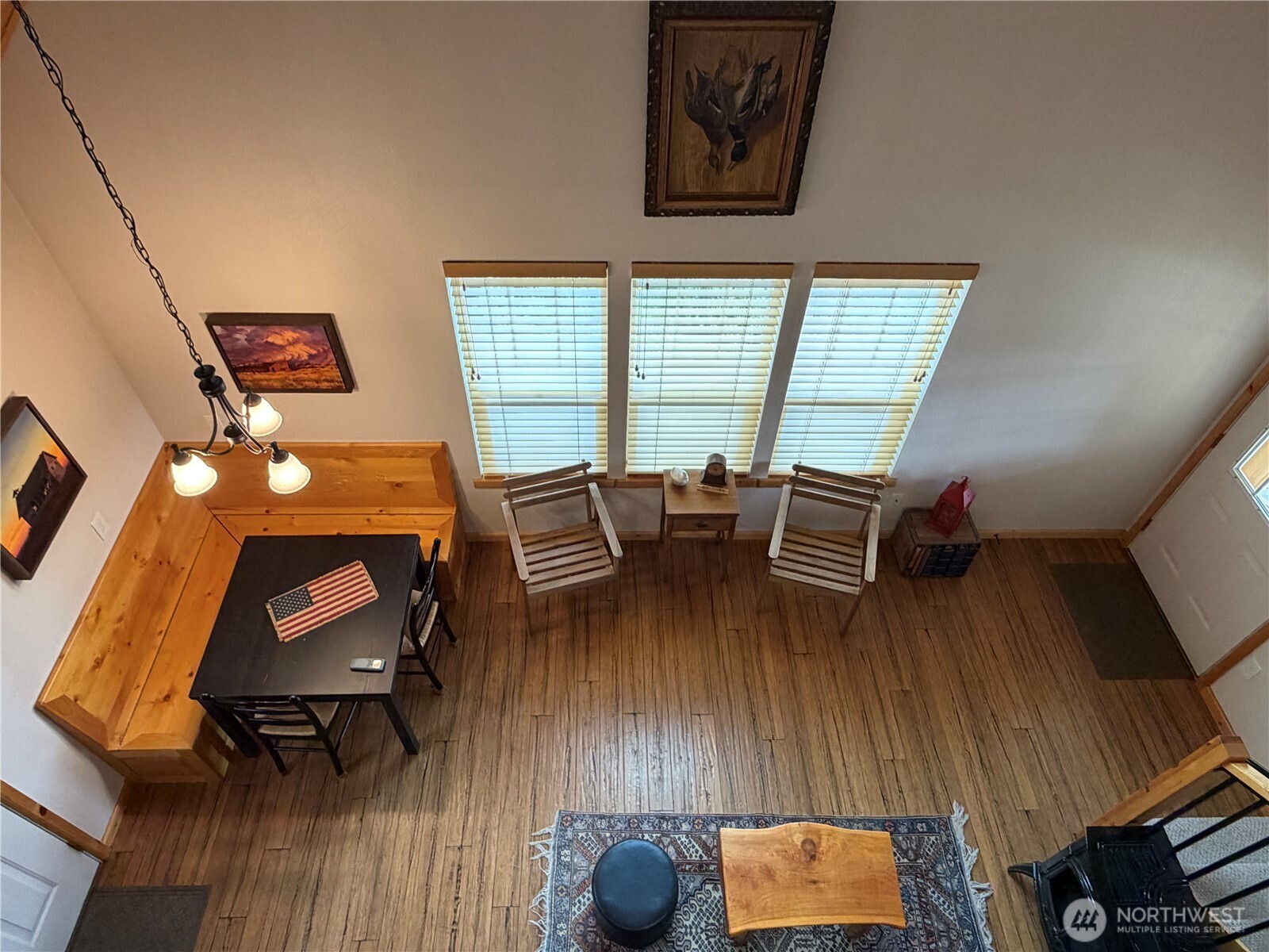 53 Cape Labelle Road Tonasket, WA 98855 - Photo 34 of 40 a view of a workspace with furniture and wooden floor