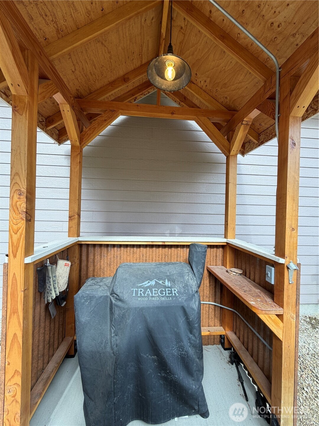 53 Cape Labelle Road Tonasket, WA 98855 - Photo 35 of 40 a view of outdoor space and barbecue grill