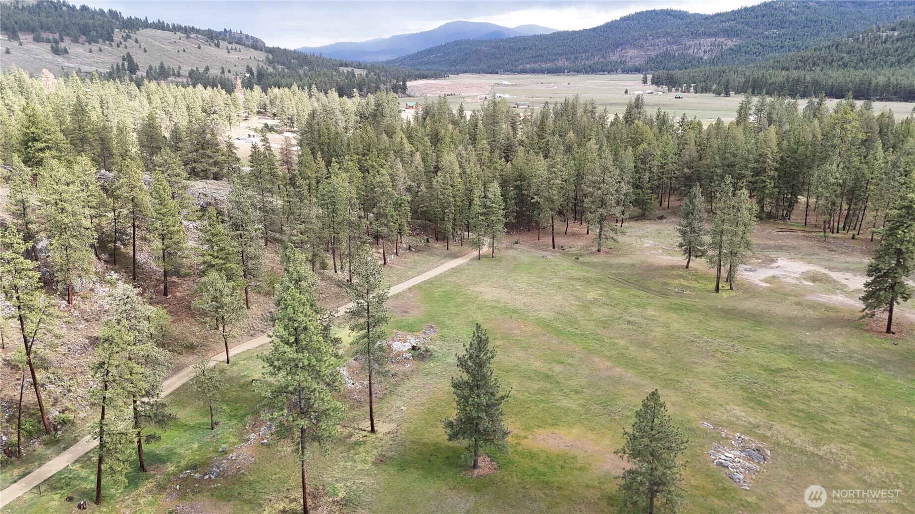 53 Cape Labelle Road Tonasket, WA 98855 - Photo 37 of 40 a view of lake with mountain