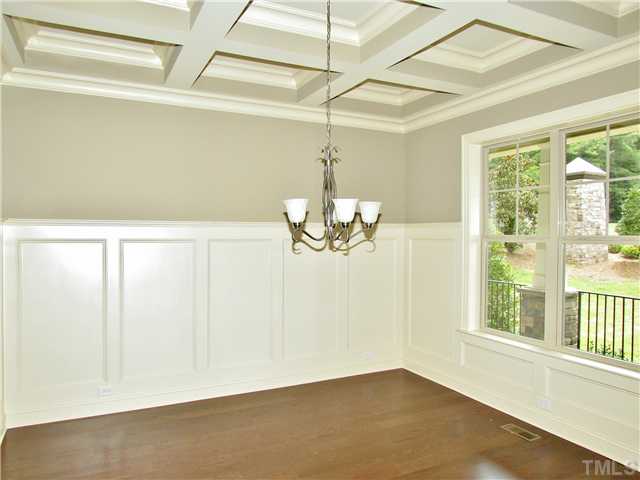 3204 Bryant Falls Court, Unit LOT58 Raleigh, NC 27613 - Photo 2 of 25 a view of a chandelier fan and wooden floor