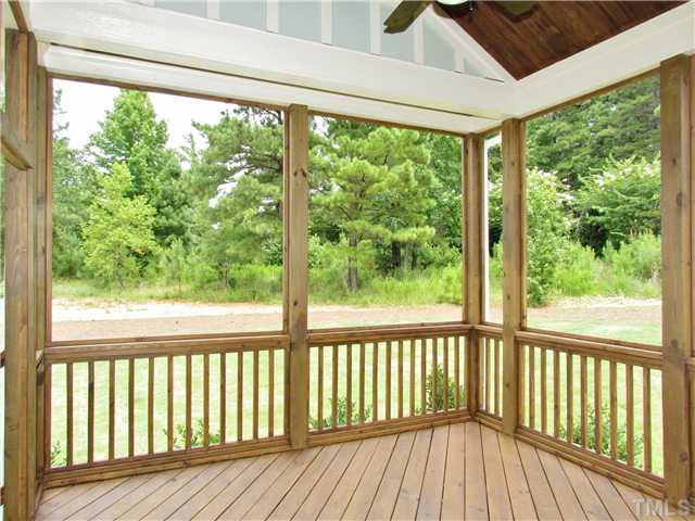 3204 Bryant Falls Court, Unit LOT58 Raleigh, NC 27613 - Photo 22 of 25 a view of wooden balcony with wooden floor