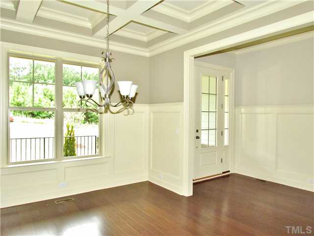 3204 Bryant Falls Court, Unit LOT58 Raleigh, NC 27613 - Photo 3 of 25 a view of an empty room with a window and wooden floor
