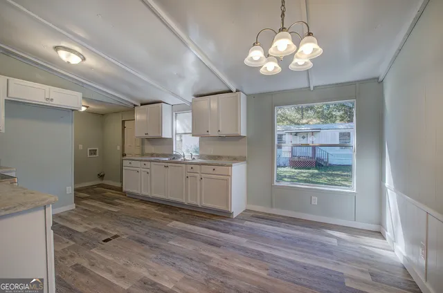 a view of a bathroom from a hallway