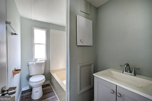 a bathroom with a sink and a toilet