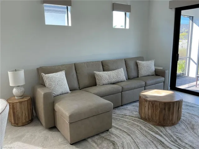 a kitchen with a table and chairs